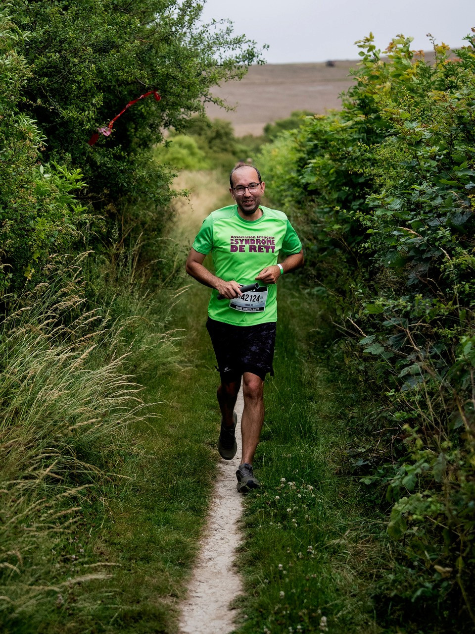 Personne qui court avec le tee-shirt AFSR